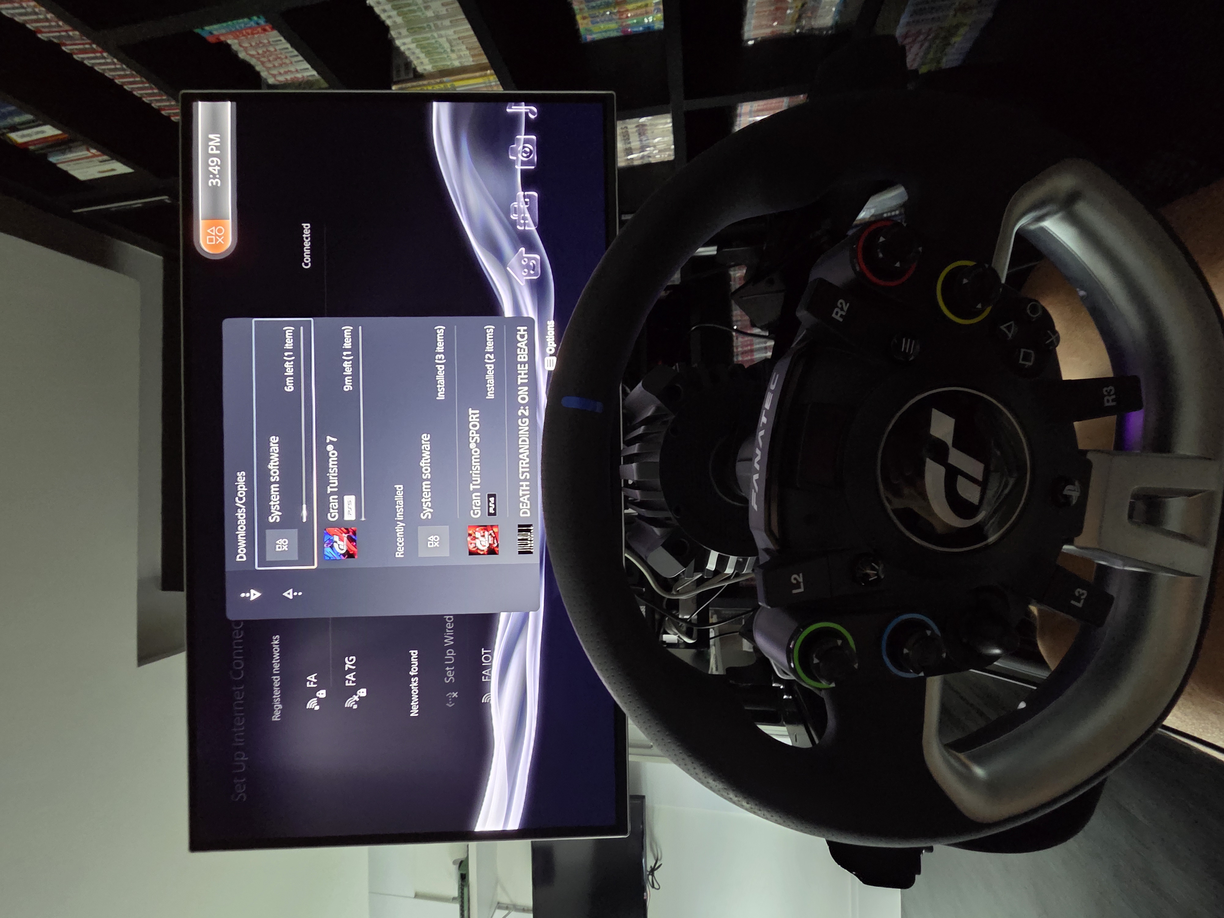 PS5 mostrando a lista de jogos — Gran Turismo 7 no topo