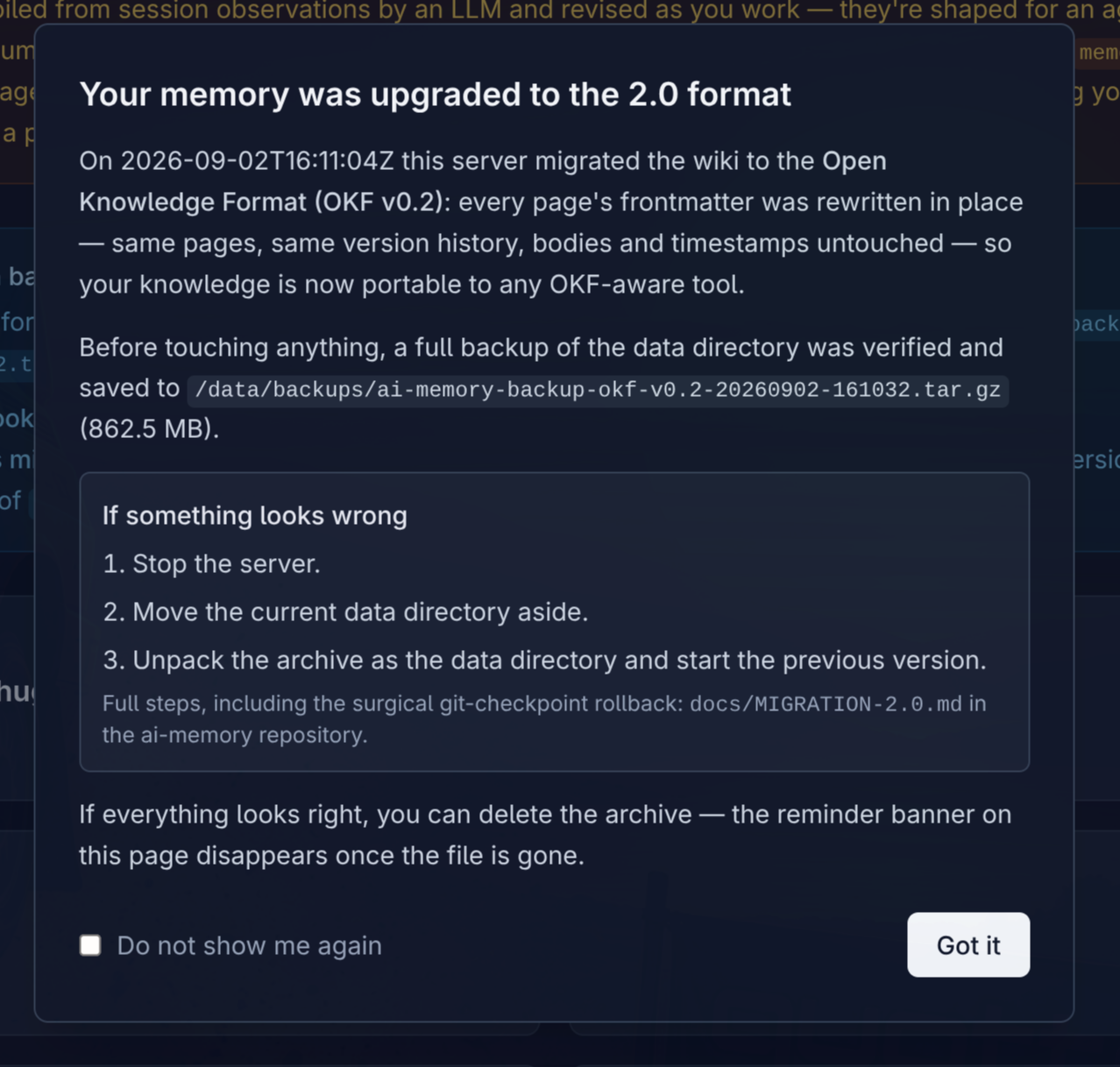 Diálogo do ai-memory 2.0 avisando que a memória foi migrada para o formato OKF v0.2, com o caminho do backup verificado e os passos de rollback