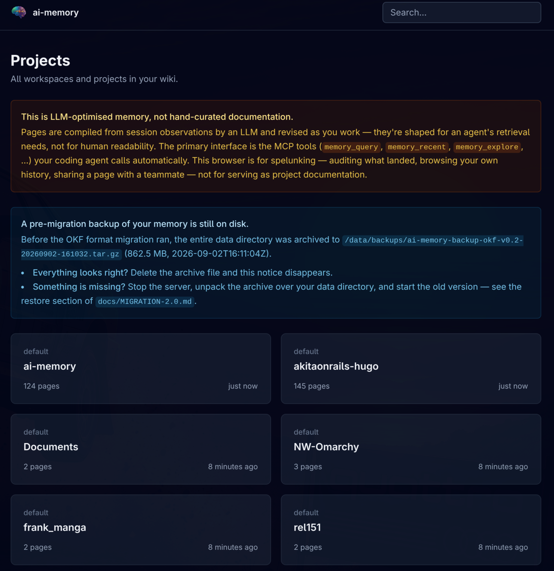 Navegador web do ai-memory 2.0 mostrando a lista de projetos da wiki, com o aviso de backup pré-migração para o formato OKF e cartões de vários projetos como ai-memory, akitaonrails-hugo e outros